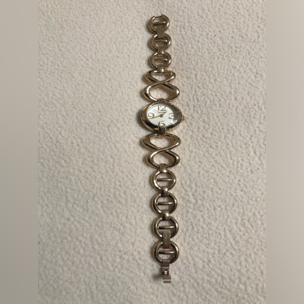 Gold tone retro look Fossil watch.